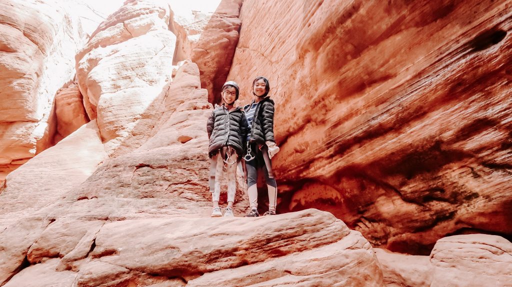 two girls rappelling at zion