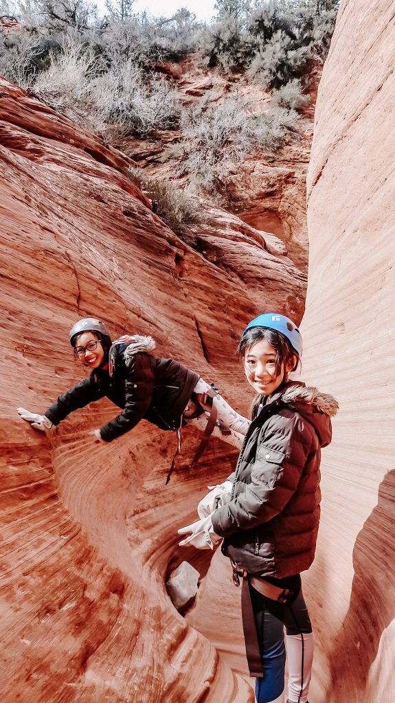 two girls rappelling at zion